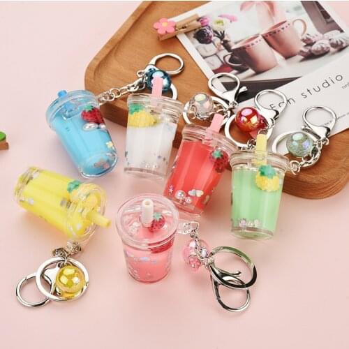Cartoon Fruit Strawberry Keyrings Acrylic Moving Liquid Car Bag Keychain decompression drift bottle Key Chains Jewelry Gifts