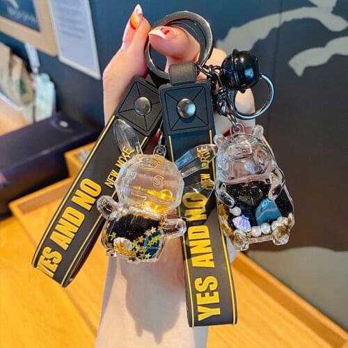 Trendy Black Gold Oil Cut Face Doll Floating Dinosaur Pendant Keychain Crystal Quicksand Sequin Female Bag Car Keyring for Girls