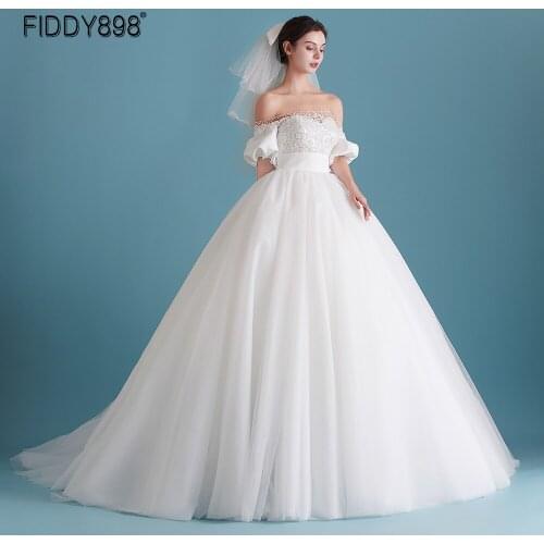Elegant Ivory Off-shoulder Beaded Ball Gown Wedding Dresses for Women 2021 Puff Sleeves Pearls Tulle Bride Wedding Gown