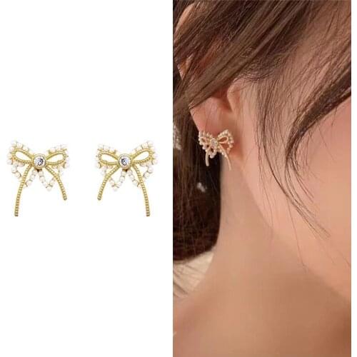 Fashion Pearl Crystal Earrings Female Earrings 2020 nian New Wave of Personality Bow Earrings Star earrings