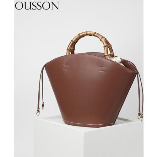 OUSSON Fashionable and versatile light drawstring closed imitation wood handle large capacity commuter leisure tote bag