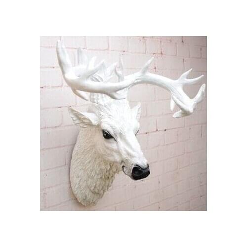 Simulation animal head. Deer head hanging wall act the role ofing