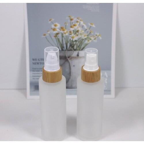 60ml glass lotion pump bottle with bamboo lid , Nice touch, beautiful spray pump glass bottle