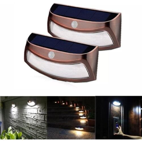 1/2PCS 8 LED Solar Power PIR Motion Sensor Smiley Light Outdoor Waterproof Copper Security Light For Garden Fence Path Wall lamp