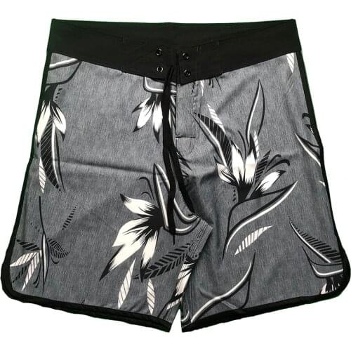Mens fitness flower shorts casual shorts hot sale of the new four - side stretch quick dry strip hot spring surfing printed bea