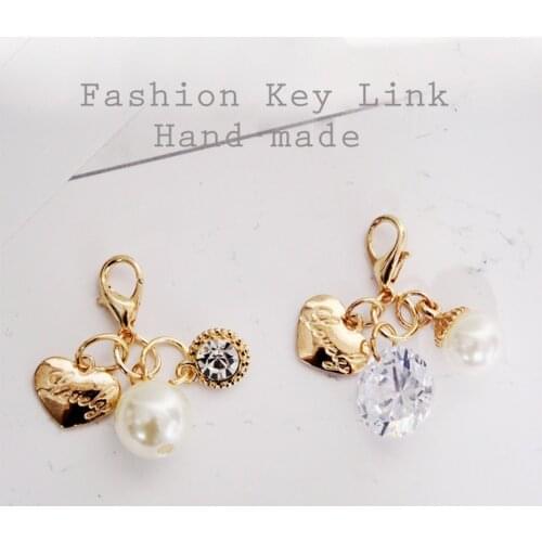 Trendy Womens' Keychains Car Keys Key Chains Bag Decor Cute luxury Pearl Pendant Charm for Airpods for Samsung Galaxy Buds Gifts