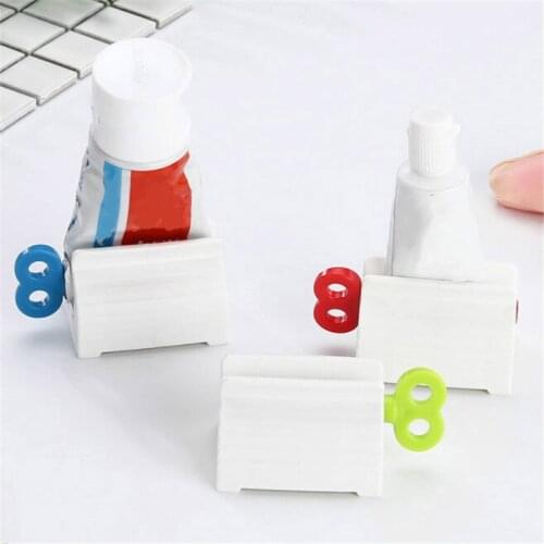 1pcs Toothpaste Rolling Tube Toothpaste Squeezer Stand Holder Bathroom Accessories