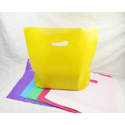 50pcs Colorful Plastic Shopping Bags with Handle Pink Boutique Clothes Gift Packaging Bag Plastic Shopping Bags Handles 4 sizes