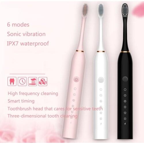 Electric toothbrush USB rechargeable ultrasonic toothbrush portable cleaning tool with 4 replacement brush heads