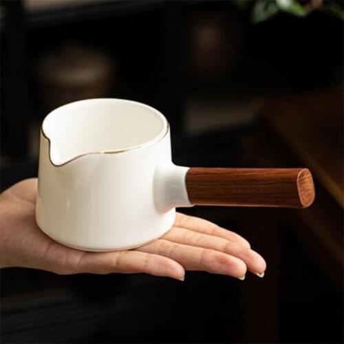 White porcelain Kungfu tea set Japanese style side handle is making home fair tea cups and ceramic tea dividers