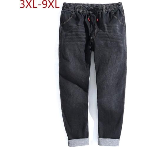 3XL-9XL Plus Size Brand Black Elastic Jeans Men Comfortable Loose Stretch Jeans Male Denim Baggy Pants Trousers Zipper Pocket