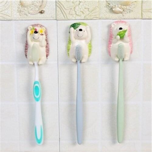 Kawaii Hedgehog Toothbrush Holder Wall Mounted Bathroom Towel Rack Washing Ball Hanger Home Plug Hook Resin Storage Rack