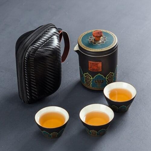 Portable ceramic travel tea set gift box individual set outdoor three cup kung-fu teapot tea set chinese