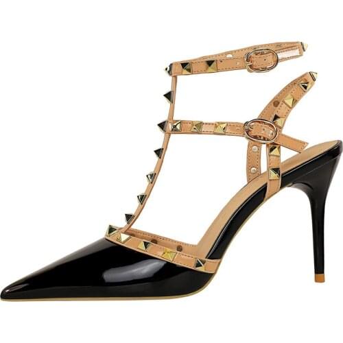 European and American retro patent leather high heel pointed Roman style metal rivet hollow sexy womens single shoes