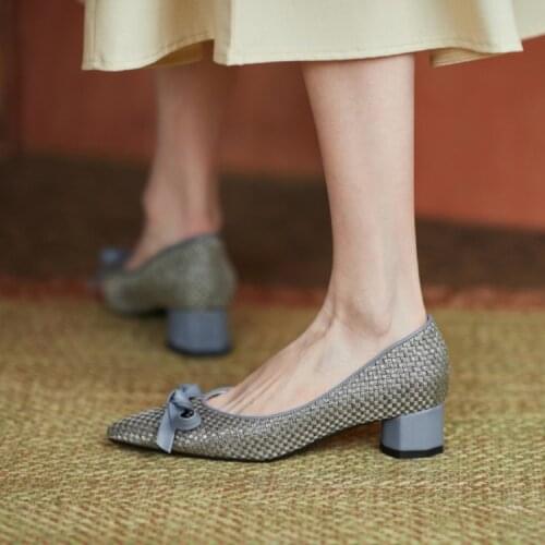 Europe 2020 new thin heel shallow mouth single shoes, pointed versatile temperament, butterfly Festival middle heel womens shoe