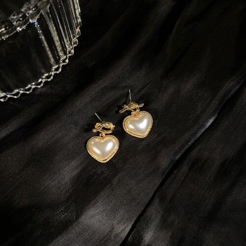 U-Magical sweet fashion tie white love heart dangle Earrings for women exquisite Simulation pearl earring jewelry pendientes