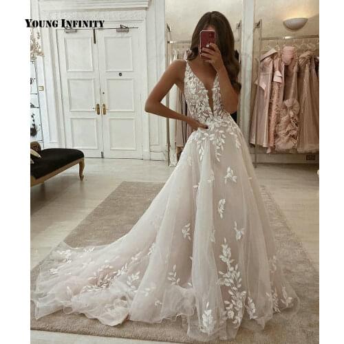 Elegant Long Wedding Dress 2021 Sexy V Neck Leaf Lace Applique Chapel Train Sleeveless Bridal Gown Custom Made Plus Size White