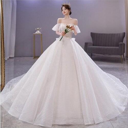Luxury O-Neck Short Puff Sleeves Wedding Dresses 2021 Sparkly Pearls Beads Princess Wedding Gown RoYal Train Vestido De Novia