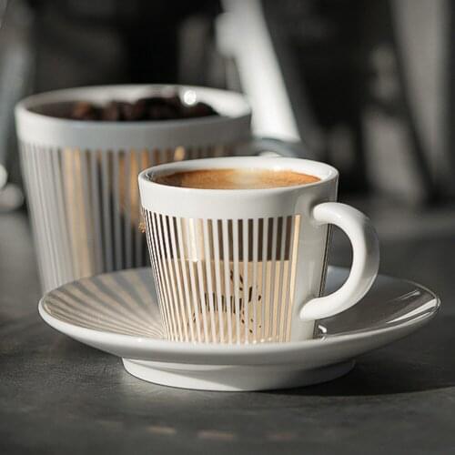 Foundtwo Coffee Cups And Saucers