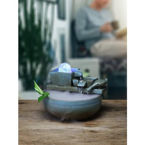 The flow of water geomantic Landscape plants Creative design Rockery fountain Desktop furnishing articles Transport bead