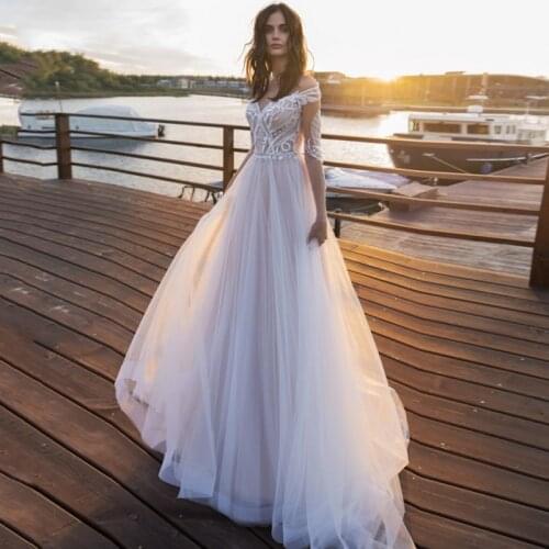 Charming Long Sleeve A-line Bridal Dresses 2021 Sweetheart Applique Beading Sweep Train Wedding Gowns Custom Made
