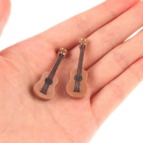 1pc Mini Fashion Cool Dollhouse Miniature Musical Guitar For doll s Dolls Accessories Christmas Childrens Day Gifts
