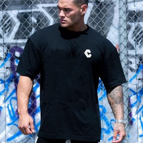 High Quality shirt Men T-shirt High Elasticity Professional Gyms Fitness O-Neck Mens T Shirts Slim Curved Hemline Raglan Sleeve