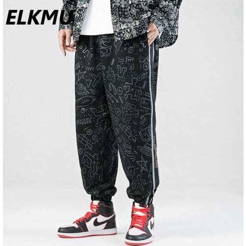 ELKMU Mens Streetwear Harem Pants Graffiti Print Fashion Sweatpants Reflective Strip Design Jogger Men Casual Trousers HM068