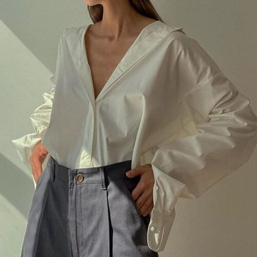 BKLD Personalized Fashion Polo Shirt 2021 Fall New Style Solid Simple Sexy Irregular Long Sleeve Patchwork Button Loose Lady Top