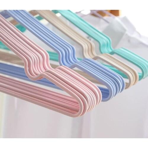 Free shipping 10pcs Hangers For Clothes Quality Eco-friendly Flock Printing Magic Hanger Slip- resistant Hangers Clothes Rack