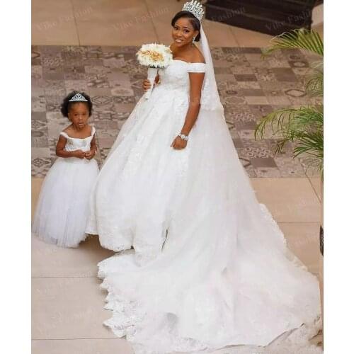 2021 African Wedding Dresses Plus Size Off Shoulder Lace Appliques Bride Dress Backless Tulle Custom Made Bridal Ball Gown