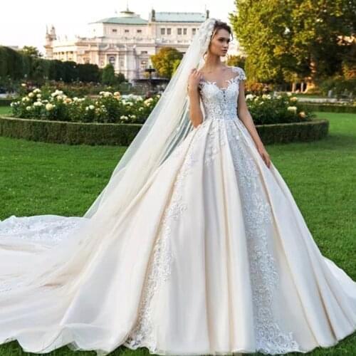 Gorgeous Ball Gown Wedding Dresses Sukienka Na Wesele Full Pearls Appliques Princess Wedding Dress With Picture Veil Matrimonio