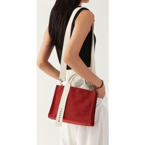 South Korea minority cross-shoulder cross-body bag handbag female bag simple all-around work canvas bag female Korean version