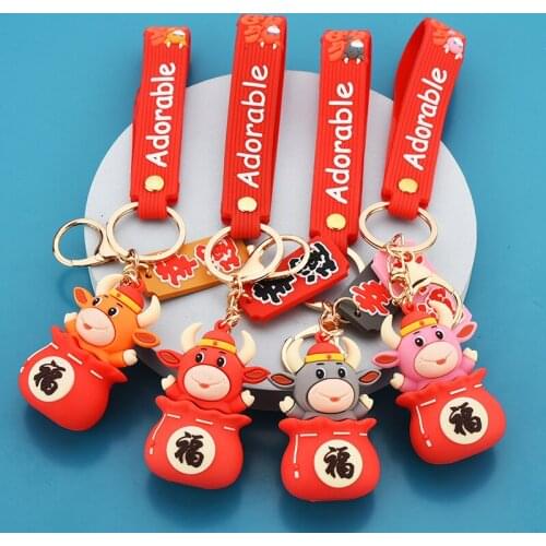 Cartoon blessed cow key ring ox year zodiac mascot men and women bag key chain pendant small gift jewelry