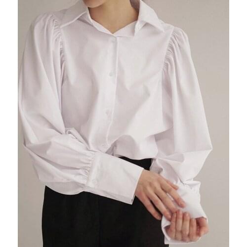 French Commuter White Shirt Womens 2021 New Loose Lantern Sleeves All-match Solid Color Professional Design Sense Blouse