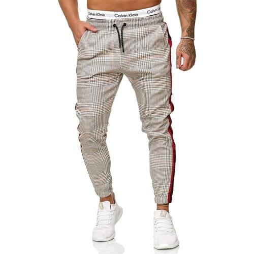 New Fashion Design Stitching Two-Color Men Trousers Black White Patchwork Streetwear Mens Clothing Jogger Zipper Casual Pants