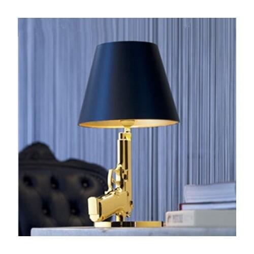 Guangshang life gilded pistol table lamp Hotel bedside study simple modern pistol lamp decoration