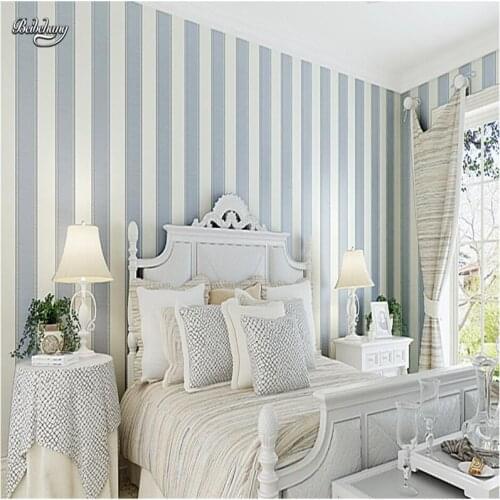 Beibehang Simple modern vertical striped nonwoven fabric 3d 3d relief flocking living room bedroom background wallpaper