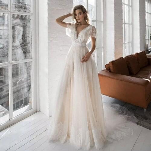 Elegant Wedding Dresses 2021 A-Line V-Neck Cap Sleeve Lace Embroidery Backless Tulle Sweep Train Bridal Gown Vestidos De Noiva