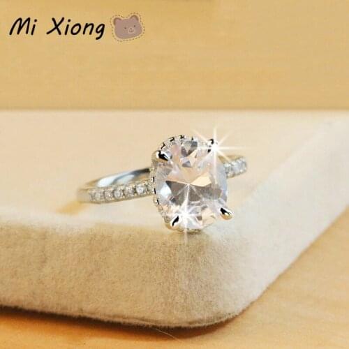 Mi Xiong women rings 925 sterling silver four-claw inlaid dove egg diamond wedding shines luxury noble engagement brand jewelry