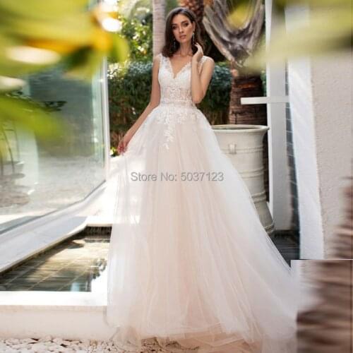 Light Pink Wedding Dresses Double V Neck Lace Appliques Bohemian Sleeveless Backless Court Train Vestidos De Noiva Bridal Gowns