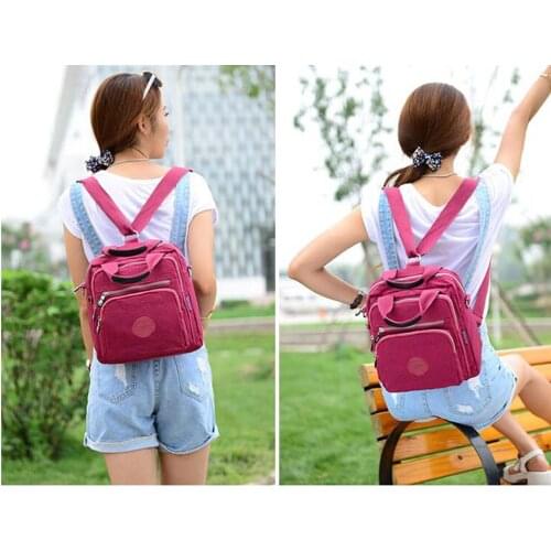 Free Shipping Fashion New Waterproof Nylon Backpack Womens Solid Light Double Shoulder Bags Leisure Outdoor Travel Bag