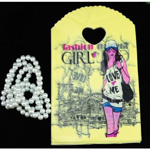 Wholesale 50pcs Girl Print Yellow Plastic Bag 13x21cm Small Shopping Candy Jewelry Packaging Plastic Gift Bags With Handle