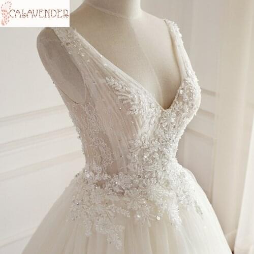White Beaded Wedding Dresses Ball Gown Lace Appliques with Crystals vestido novia V-neck Floor Length Bride Dress Wedding Gowns