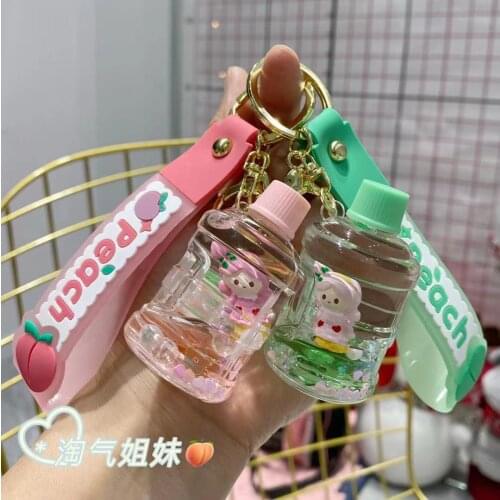 New Oil Bottle Keychain Creative Oil Floating Girl Key chain Trend Acrylic Bucket Keychain Accessories Womens Bag Keychain