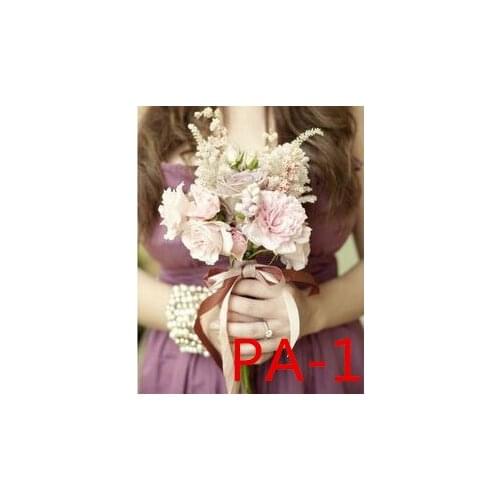 New wedding holding a bouquet of flowers to decorate fake flower home emulation flower ornaments PA
