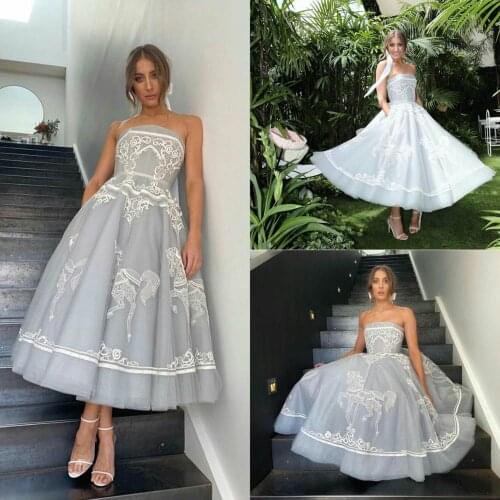 Tea Length Prom Dresses With Pockets Strapless Lace Embroidery Formal Evening Dress A Line Arabic Special Robes De Soirée