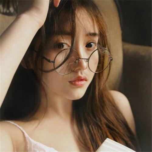 JAXIN Simple Fashionable round glasses women metal frame handsome transparent glasses men retro personality flat mirror UV400
