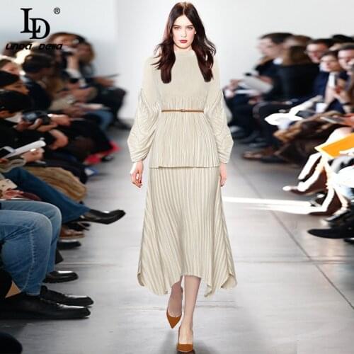 LD LINDA DELLA New 2021 Summer Runway Solid Asymmetrical Skirts Suit Women Lantern Sleeve Loose Tops＋Skirts Pleated 2 Pieces Set