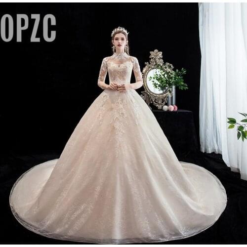 Fashion Elegant High Neck Luxury Lace Muslim Wedding Dress 2021 New Champagne Long Train Applique Princess Brida Robe De Mariee